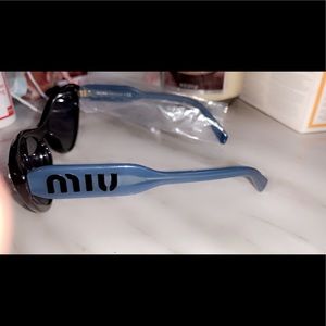 MIU SUNGLASSES BRAND NEW NEVER WORN! Paid 570 asking for 150 or best offer!